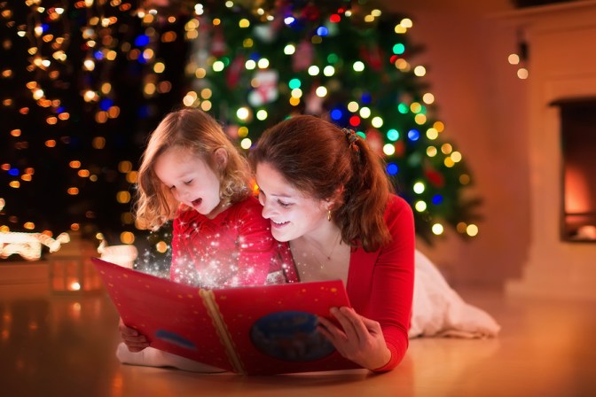 reading under the christmas tree.jpg