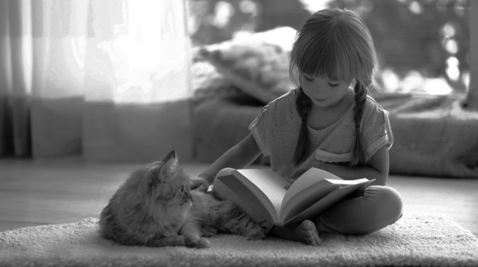 child reading with a cat.jpeg